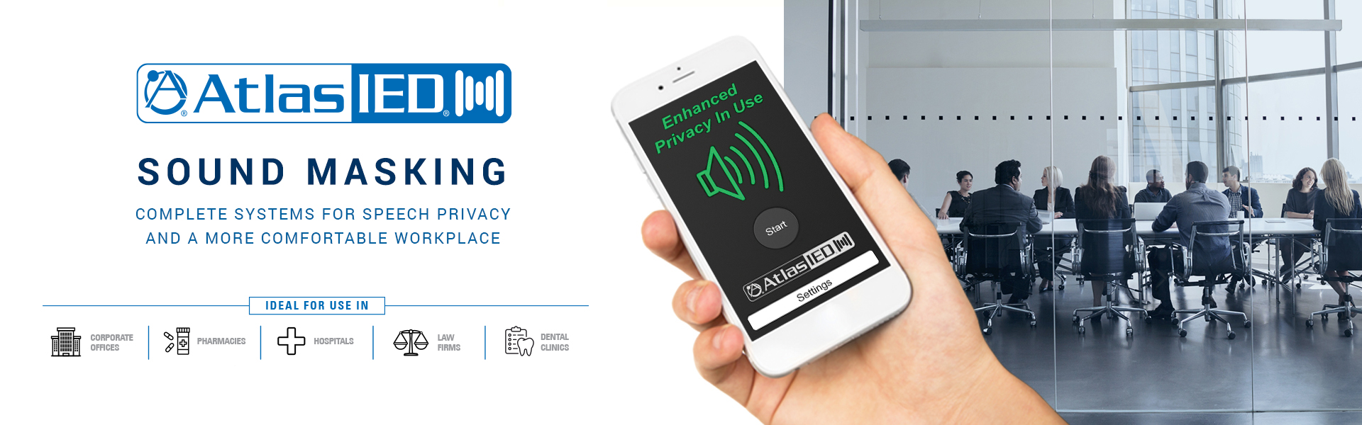 Hand holding a mobile device showing alert from sound masking system for speech privacy at the workplace